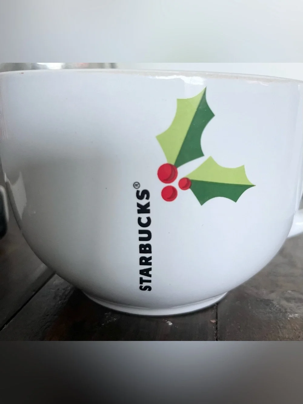 Starbucks holiday mug is in excellent condition. White oversized mug reads STARB